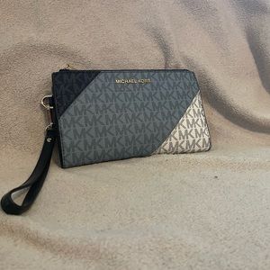 Michael Kohrs wallet. Blue monogram. Beautiful. Gently used. Great condition.